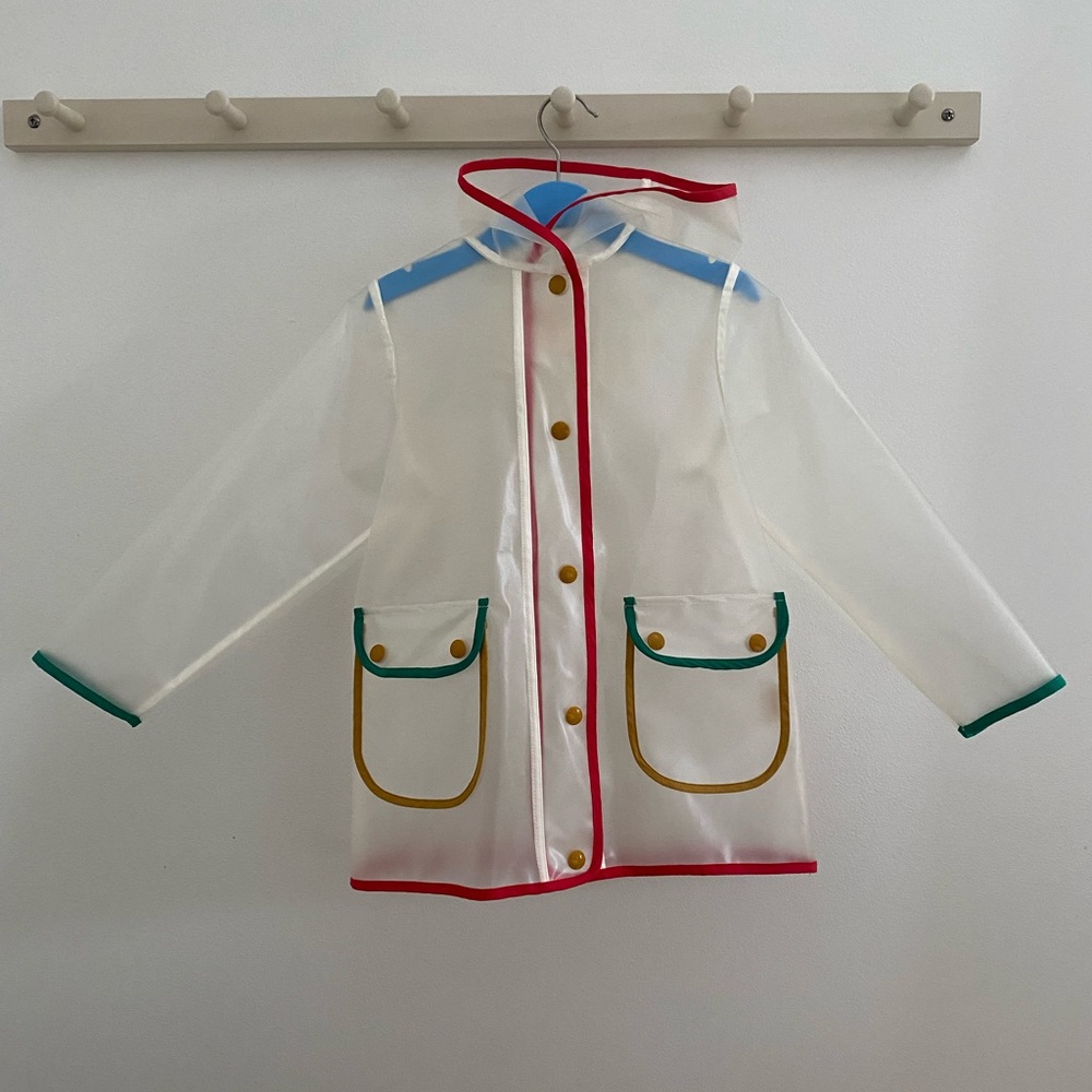 Fin and Vince clear rainbow lined rain jacket.